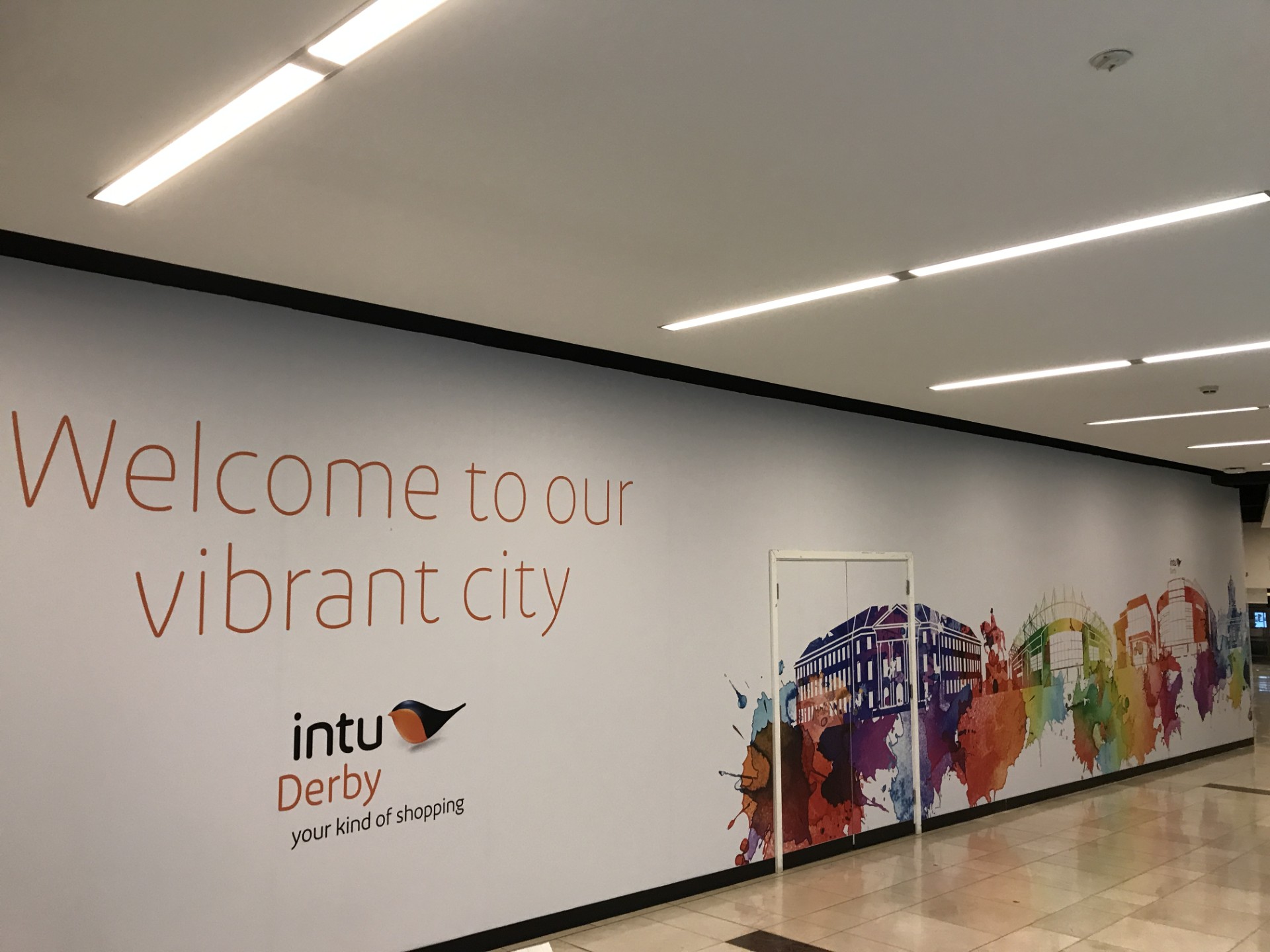 Large format wall mural installation at Intu Derby shopping centre by UK Install